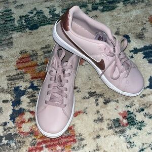 Purple Nike sneakers with metallic Nike sign. Worn once in perfect condition